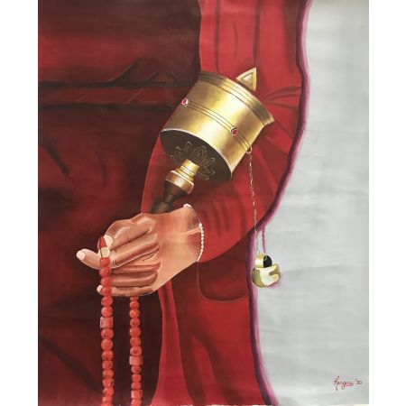 Buddhist monk with prayer wheel
