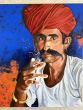 The Gaze - smoking men wearing a red turban